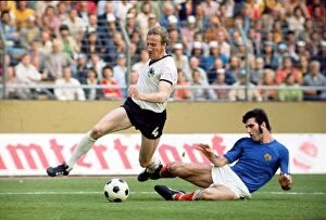 Images Dated 26th June 1974: World Cup 1974 W. Germany v Yugoslavia Schwarzenbeck rides a
