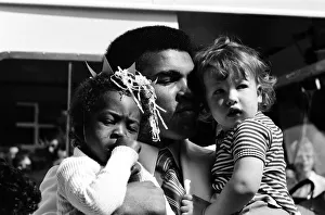 World heavyweight boxing champion Muhammad Ali presented a sunshine coach on the behalf World heavyweight boxing champion Muhammad Ali presented a sunshine coach on the behalf