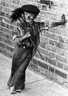 Four year old chimney sweep Tommy Stafford in fancy dress to celebrate the 100th Four year old chimney sweep Tommy Stafford in fancy dress to celebrate the 100th