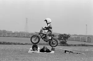 Four year old Jarno Barratt of Corby, Northamptonshire, performs a stunt on his 50 cc Four year old Jarno Barratt of Corby, Northamptonshire, performs a stunt on his 50 cc