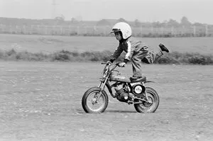 Images Dated 10th June 1979: Four year old Jarno Barratt of Corby, Northamptonshire, performs a stunt on his 50 cc