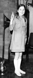 Nine year old Marion Scott in a 1923 Brownie uniform whcih cost £9. 6d Nine year old Marion Scott in a 1923 Brownie uniform whcih cost £9. 6d