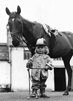 Images Dated 1st August 1974: Two year old Rhodrik Blair seen here with racehorse Laughing Boy 1st August 1974
