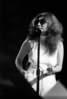 Yoko Ono singing in a charity concert in New York with her husband John Lennon Yoko Ono singing in a charity concert in New York with her husband John Lennon