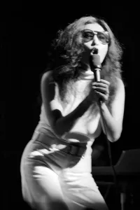 Yoko Ono singing in a charity concert in New York with her husband John Lennon Yoko Ono singing in a charity concert in New York with her husband John Lennon