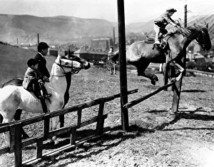 Three very young boys: Peter, Tony, & Kaye, riding horses at their father' Three very young boys: Peter, Tony, & Kaye, riding horses at their father'