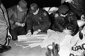 A young child who broke his leg roller skating being given medical assistance by New York A young child who broke his leg roller skating being given medical assistance by New York