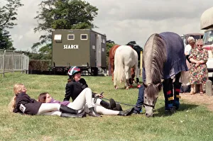 Young girls with horses enjoy St Helens show. Sherdley Park, St Helen, Merseyside Young girls with horses enjoy St Helens show. Sherdley Park, St Helen, Merseyside