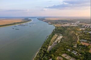 Images Dated 24th August 2019: Aerial view of Galati City, Romania. Danube River near city with sunset warm light