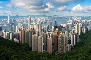 Hong Collection: Aerial view of Hong Kong skyline and Victoria Harbor with blue sky in Hong Kong. Asia