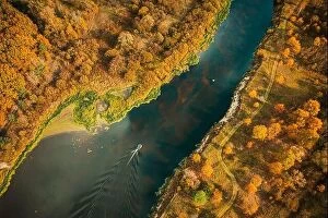 Russia Collection: Aerial view of yellow forest woods and river marsh bog in autumn landscape