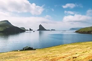Denmark Collection: Breathtaking view on Drangarnir and Tindholmur sea stacks in Atlantic ocean, Faroe Islands