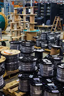 Many cable drums ready for electrical installation Print