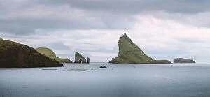 Denmark Collection: Dramatic panoramical view on Drangarnir and Tindholmur sea stacks in Atlantic ocean, Faroe Islands