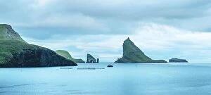 Denmark Collection: Dramatic panoramical view on Drangarnir and Tindholmur sea stacks in Atlantic ocean, Faroe Islands