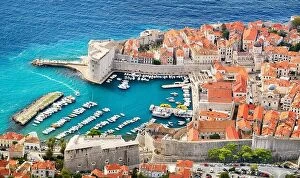 Croatia Collection: Dubrovnik old town, elevated view to harbor, Croatia
