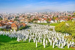 Bosnia and Herzegovina Collection: Kovaci war cemetery and Sarajevo cityscape, Bosnia and Herzegovina