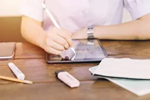 School Student Using Touchscreen Tablet Computer Print