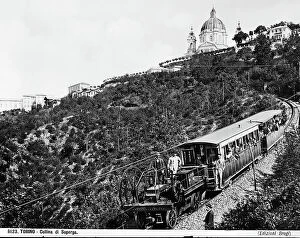 Images Dated 10th October 2013: The cable railway running coming the hill of Superga with passengers leaning out of the windows