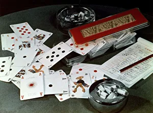 Playing Cards Prints: Close up of playing cards lying on a table
