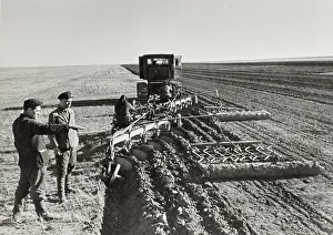 Farming Scene Prints: A field is mechanically cleared