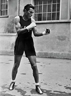 Male Athlete Portrait Prints: A fighter during training