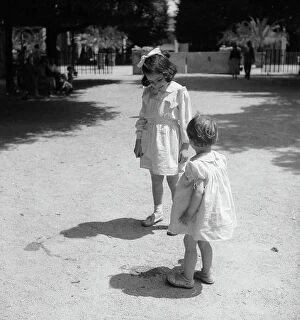 Images Dated 30th May 2016: Two girls playing in a park, Venice