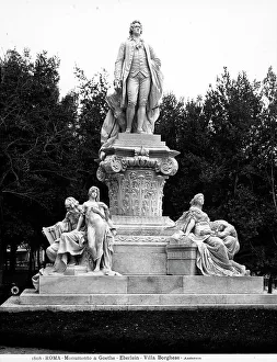 Monument to Goethe, work by Gustav Eberlein, in the park of Villa Borghese in Rome: the statue of the poet is collocated on a composite capital