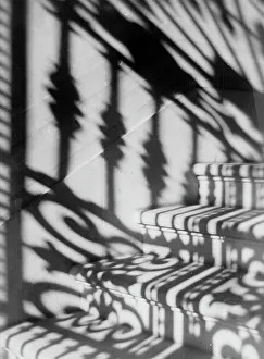 Shadows of a railing on the steps; Photo studio