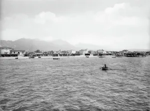 Street Art Prints: View of Forte dei Marmi and its beach seen from the loading bridge on the sea