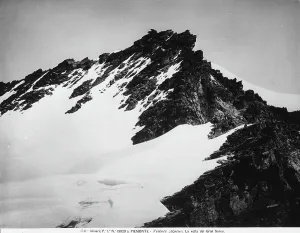 Mountain Climber In Snow Prints: View of the summit of Gran Serce in Piemonte