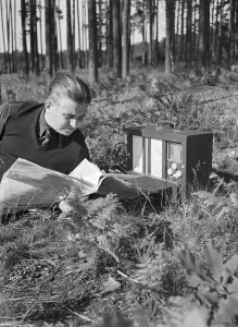 Print of a Young Man Reading Newspaper in the Forest, Germany 1930s