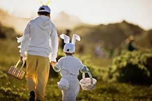 Two Brothers in Easter Costumes on an Easter Egg Hunt Print