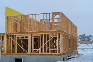 Residential Building Structure Prints: Building frame structure on a new development timber frame for a progressing house