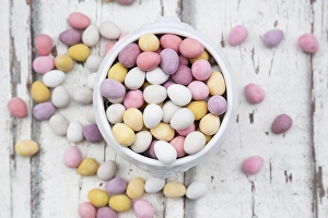 Coloured Easter Eggs Prints: Chocolate Easter eggs in bowl