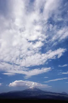 Tranquil Nature Scenes Prints: Clouds over a snowcapped mountain