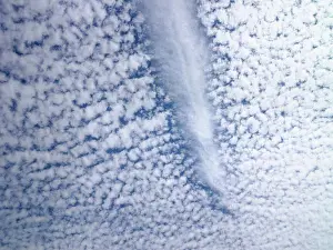 2021 Prints: Jetstream Print: Dissipating Path Through Fluffy Clouds