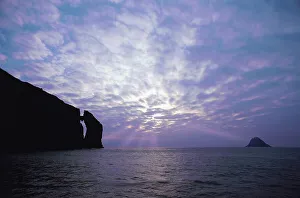Tranquil Ocean Views Prints: Silhouette of Cliffs at a coast