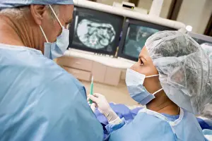 Surgeon Operating Room Prints: Surgeons During An Operation