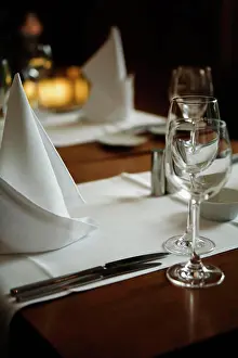 Restaurant Table Setting Prints: A table set for dinner in a restaurant