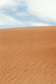 Gobi Desert Landscape Prints: Waves in the sand against a cloudy sky