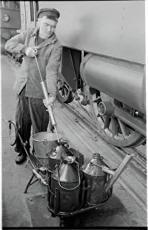 Swedish Railway Museum Prints: Workshop worker with lubrication