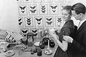 Young Adults In Love Prints: In the 1950s. A young with the typical 1950s designed objects