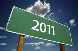 Dramatic Road Sign Prints: 2011 road sign with dramatic clouds and sky