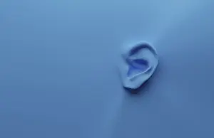 Communication Concept Image Prints: 3d rendering of an ear on a blue background with space for your text or image