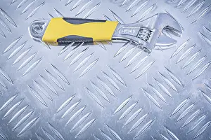 Adjustable Spanner Prints: Adjustable spanner on chequer plate Design concept