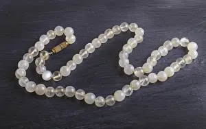 Semi Precious Stone Gifts Prints: Agate colored beads on a black background