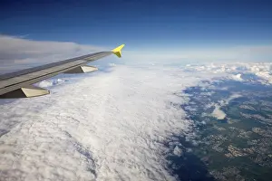 Prints of Aircraft in flight above a cloud front, Baden-Wurttemberg, Germany Aircraft in flight above a cloud front, Baden-Wrttemberg, Germany Aviation Prints: Aircraft in Flight Print, Baden-Wurttemberg, Germany