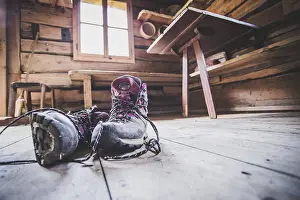 Wooden Floor Covering Ideas Prints: Alpine boots inside of a rustic mountain chalet