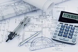 Architect Construction Plan Prints: An architect's construction plan with a calculator